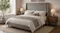 Angled view of the Alena Queen headboard in a modern beige and grey bed setup Angled view of the Alena Queen headboard in a modern beige and grey bed setup
